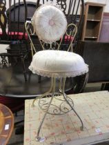 A gilt metal framed bedroom chair