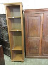 A pine slimline bookcase