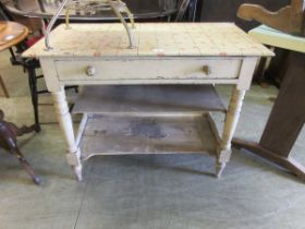 A white painted washstand