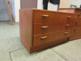 A mid-20th century teak chest of three drawers