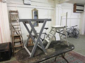 A pale blue stand with a twin handled tray together with a folding painted step chair