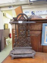 A cast iron stick stand