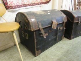 Two canvas dome topped travelling trunks