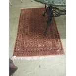 An eastern brown rectangular rug