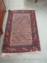 An eastern red and blue ground rug