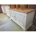 A high quality oak topped white painted two door cupboard Dimensions: H, 70cm , W, 124cm , D, 53cm.