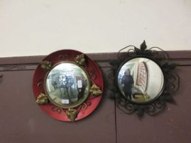 Two metalwork framed convex wall mirror