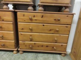 A modern pine four drawer chest