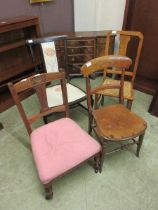 Four assorted early 20th century hall chairs
