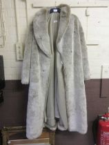 A 100% acrylic grey fur coat