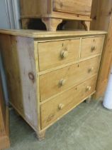 A pine chest of two short over two long drawers