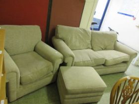 A John Lewis large beige coloured two seater sofa along with matching chair and footstool