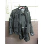 A Jofama motorcycle jacket and trousers with built in protection, size S