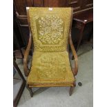 A Regency style open arm chair
