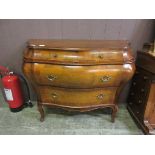 A modern French style Bombé commode with two short over two long drawers, approx. 114cm wide