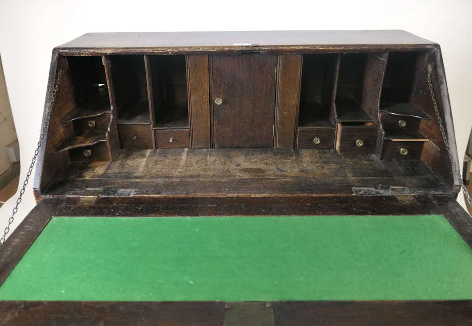 A George III oak bureau, the fall front with brass escutcheon above an inlaid marquetry conch shell, - Image 4 of 4