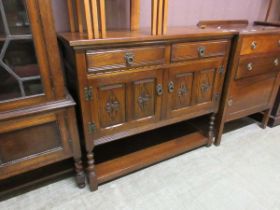 An Old Charm sideboard on bobbin turned legs with under tier, 107cm wide
