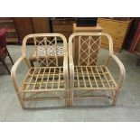 A pair of cane conservatory seats