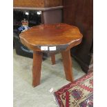 A Wanderwood rustic side table, 45.5cm diameter