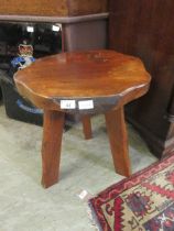 A Wanderwood rustic side table, 45.5cm diameter