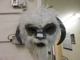 A wall mounted trophy head mask of the Wampa monster from Star Wars – The Empire Strikes Back