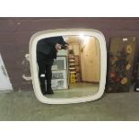 A 1970s style mirror, 16.5" tall