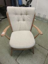 An Ercol style spindle back armchair