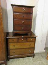 A Stag Minstrel chest of drawers along with a matching bedside chest
