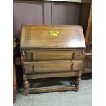 An early 20th century oak bureau