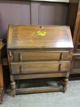 An early 20th century oak bureau