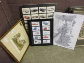 A framed and glazed collection of cigarette cards depicting Jaguar cars along with decorative