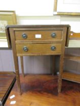 A reproduction drop leaf side table with two drawers