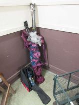 A pair of Volkl skis with sticks and a pair of Nordica size 10 ski boots in carry case