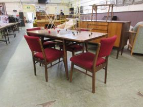 A mid-20th century Everest extending dining table with a set of four matching chairs