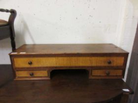 A 19th century section of furniture comprising of one long drawer above short drawers