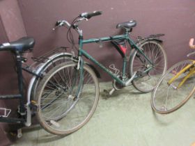 A gent's green Raleigh touring bicycle