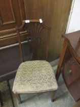 An early 20th century mahogany and satinwood banded lyre back chair with floral upholstery