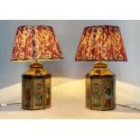 OKA TABLE LAMPS, a pair, canister form gilded and painted with terracotta pleated fabric shades,