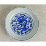 CHINESE BLUE AND WHITE PORCELAIN DRAGON DISH, decorated with dragons chasing pearls of wisdom