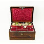 SEWING BOX, Victorian, circa 1850, rosewood and brass bound, the lid enclosing a fitted silk lined