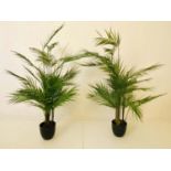 FAUX PALM TREES, pair, 110cm high x 60cm diameter, in black planters. (2)