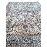 ANTIQUE PERSIAN KERMAN LAVER CARPET, 360cm x 270cm.