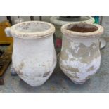 OLIVE JARS, a near pair, painted terracotta, 69cm x 50cm at largest. (2)