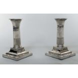 SILVER CANDLESTICKS, a pair, Victorian hallmarked London 1897 maker Hutton & Son, 17cm H. (2)