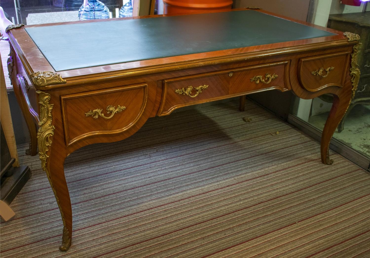 BUREAU PLAT, 81cm H x 173cm x 100cm, Louis XV style with green leather top, three drawers and