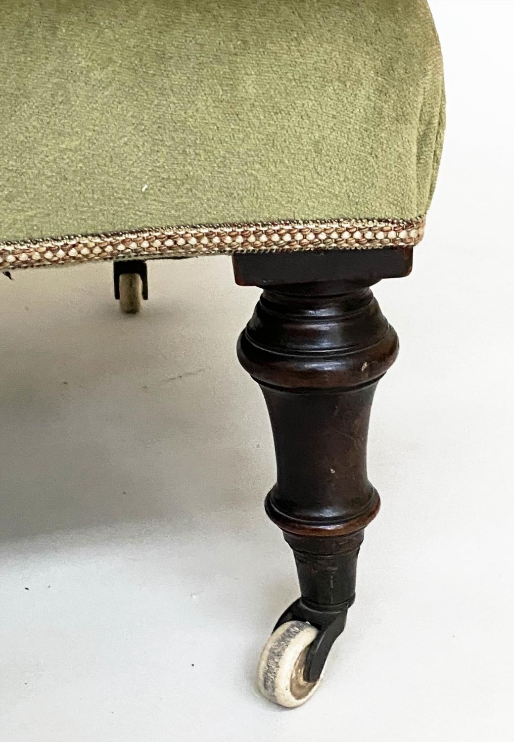 ARMCHAIR, Victorian, moss green velvet upholstered with arched buttoned back and turned supports, - Image 4 of 8