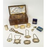 QUANTITY OF SILVER, including decanter labels. grape shears, napkin holders a match striker and