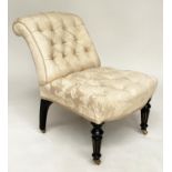 SLIPPER CHAIR, Victorian aesthetic period ebonised and gilt with buttoned cream brocade