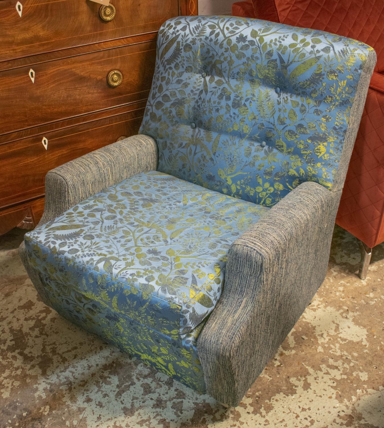 ARMCHAIR, 81cm H x 71cm, mid 20th century in blue leaf patterned and ribbed upholstery on castors.