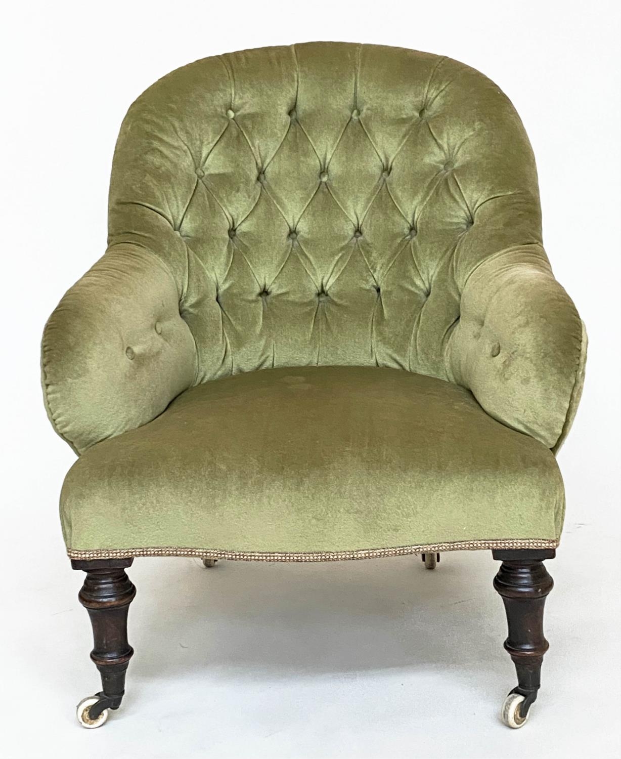 ARMCHAIR, Victorian, moss green velvet upholstered with arched buttoned back and turned supports, - Image 8 of 8